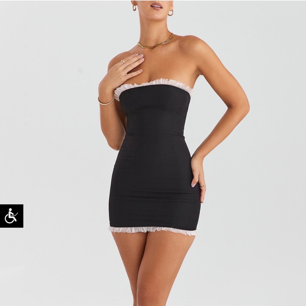 Mistress rocks black strapless mini dress